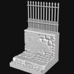 Basetta con strada e muro con inferriata